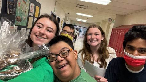 Best Buddies Presidents Josie Starr and Dani London deliver cookies on Mar. 17 along with buddies Danny Fitzgerald, Edwardo Prudenci and Dinesh Augustus.