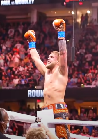 Jake Paul celebrates a victory over mixed martial artist Tyron Woodley. This was their second bout and took place on Dec. 18, 2021, in Tampa, FL.