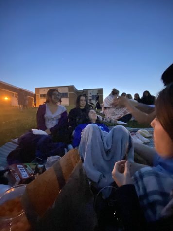 Seniors Jahnavee Chakravarty, Esther Pustylnik, and Nicole Riba enjoy a final night as seniors at senior sunset on the Frost Hill.