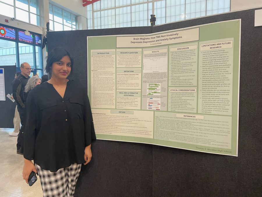 Senior Sureena Atwal attends the AP Research symposium on Apr. 26, where her poster with her research topic and results is up for display for parents, students, and teachers to view.
