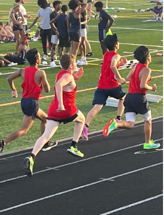 Patriots race to the finish in the final 100 meters of the boys 1600 meter run at the meet between Wootton, Walter Johnson and Bethesda Chevy Chase.
