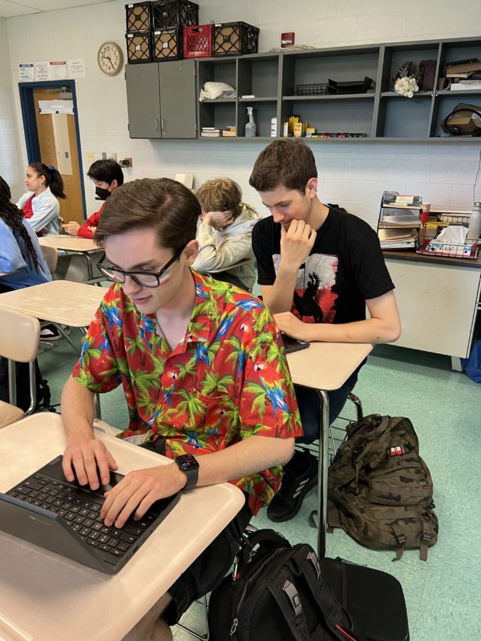 Seniors Andrew Sill and William Rusiecki work on their AP Research final project where they make their course plan for college.