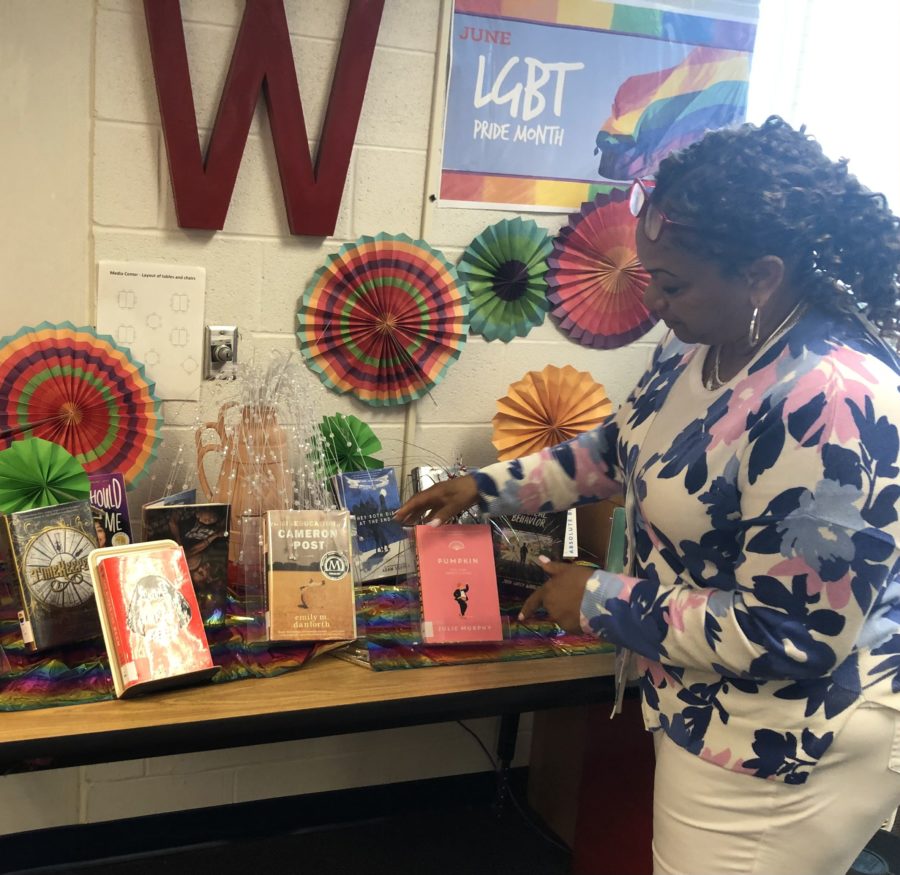 Media specialist Tammie Burk displays books for Pride Month. Students can celebrate by reading LGBTQ+ books this June.