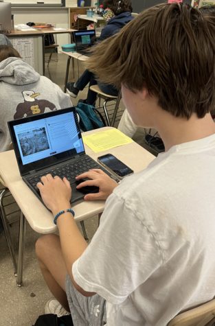 Sophomore Alex Foster works on a practice AP US History exam. AP US History is one of the seven exams taken on computers this year. The College Board is using an app called Bluebook for online exams.