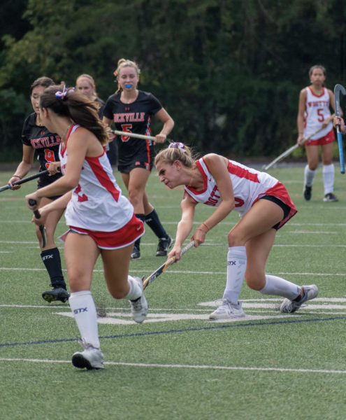 Junior Nikki Cohen passes the ball up to junior Jenna Goldberg who scores, resulting in a 3-0 lead at end of the second quarter against Rockville.