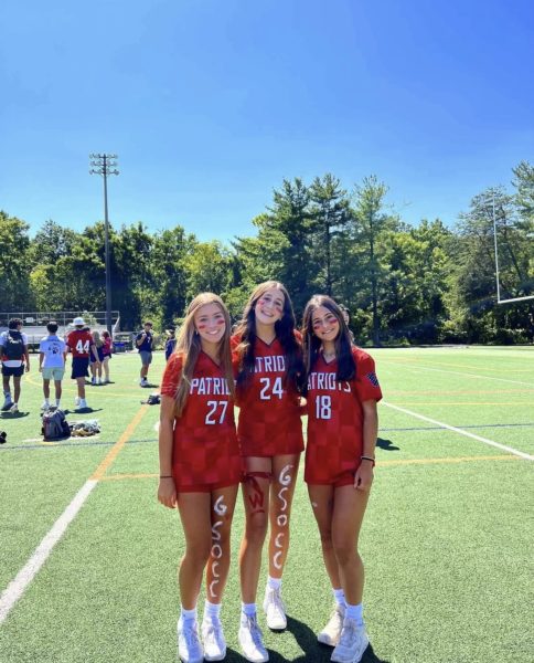 Freshmen Manu Palmeida, Alex Rabin and Anna Sofronas showed spirit on the field at the first pep rally of the year on Sept.1.