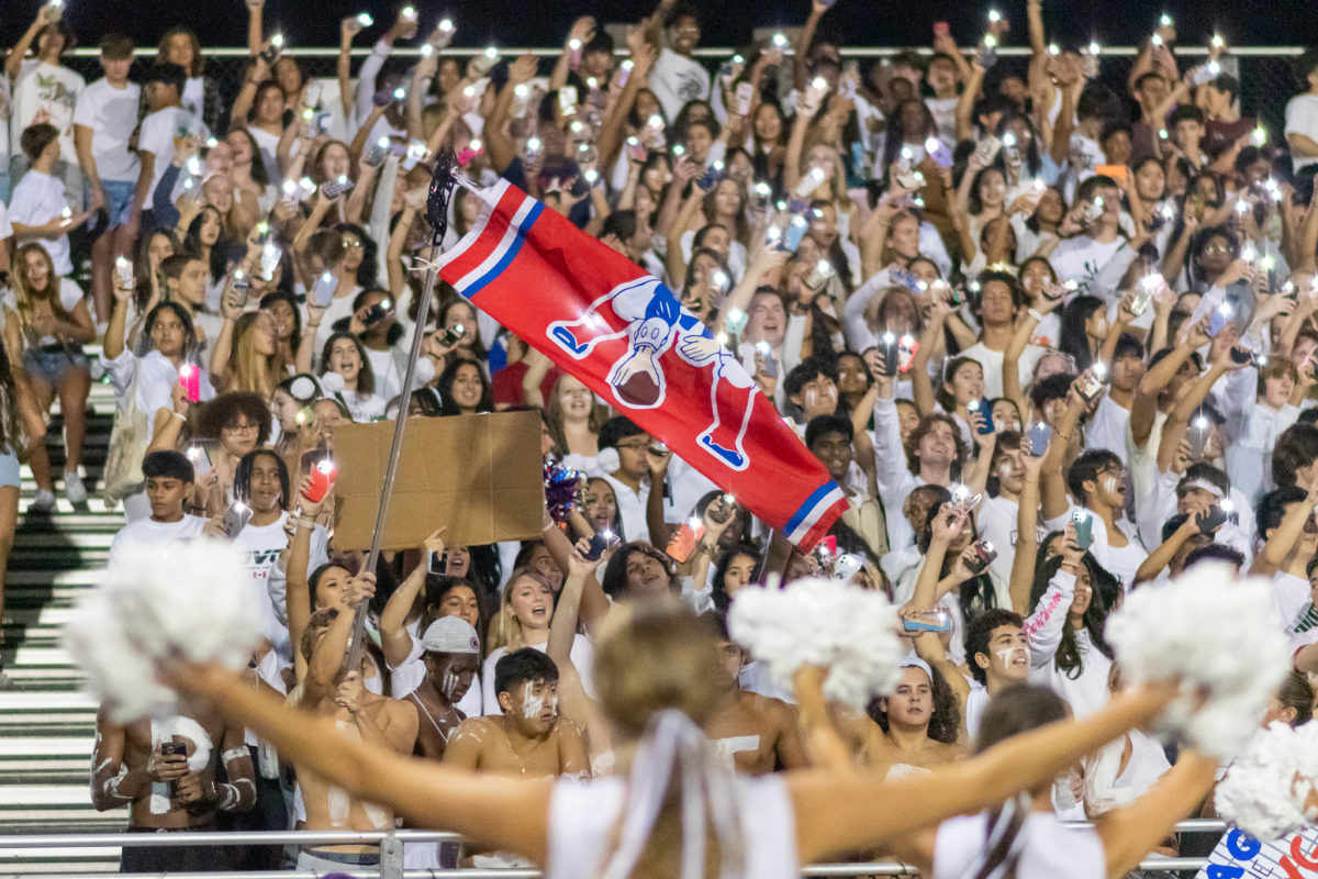 Students+deck+themselves+out+in+white+to+support+the+football+team+during+the+fun+fall+semester.