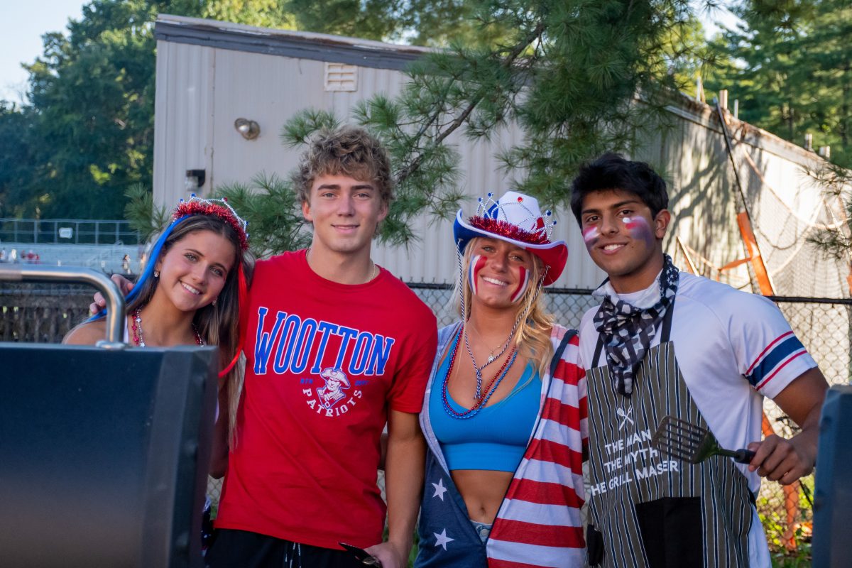 Senior grill masters Lizzie Misovec, Holden OBrien, Lindsey McNey and Zo Singh at the first football game on Sept. 1.