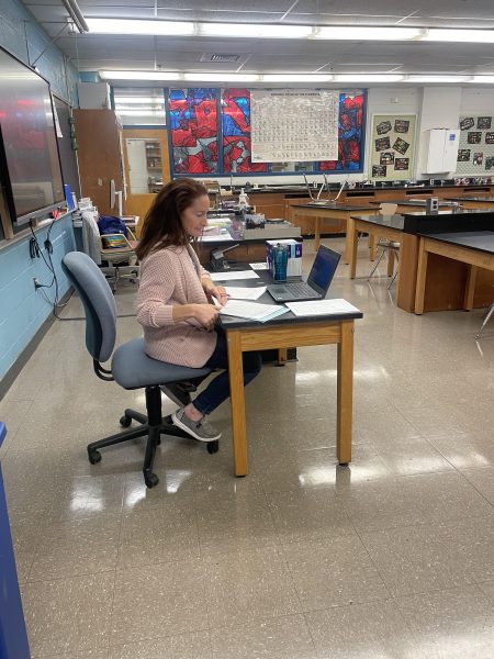 Science teacher Ellen Polster prepares work and lesson plans for her students during her free period on Nov. 20.