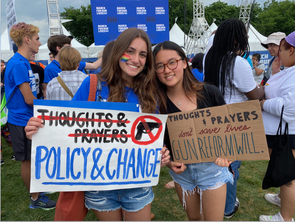 Senior Emily Liu (right) at the annual March For Our Lives in D.C.. Students continue to be involved in politics, despite increasing polarization around the country.