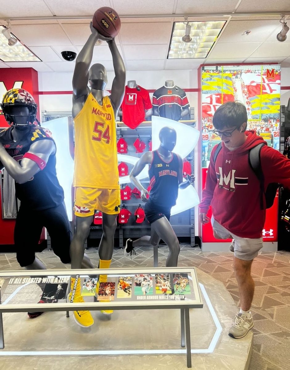 Senior Sachin Bijlani explores the UMD student store during the AP Research field trip.