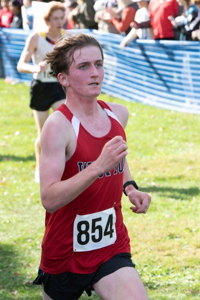 Sophomore Nathan Downie runs in the cross country county championships this fall.