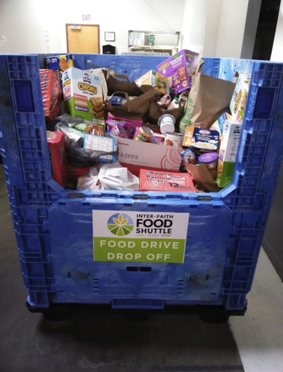 The+SGA+food+drive+bin+held+from+Nov.+27+to+Dec.+1+fills+up+with+goods+to+be+donated.