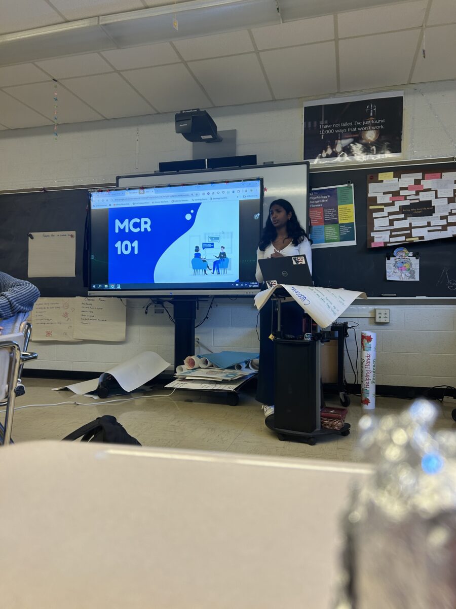 Junior Ashi Stanislaus speaks about the core foundations of MCR at the MCR interest meeting on Dec. 14, 2023.