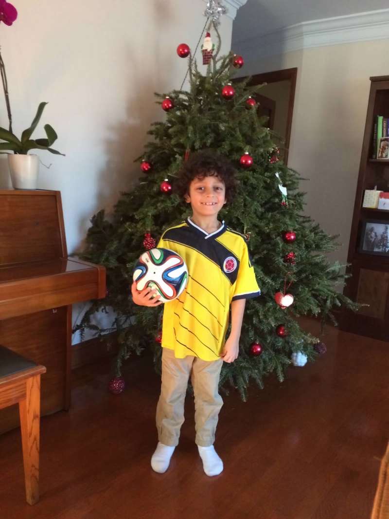 Junior Daniel Yaya represents Colombias national soccer team as a child.