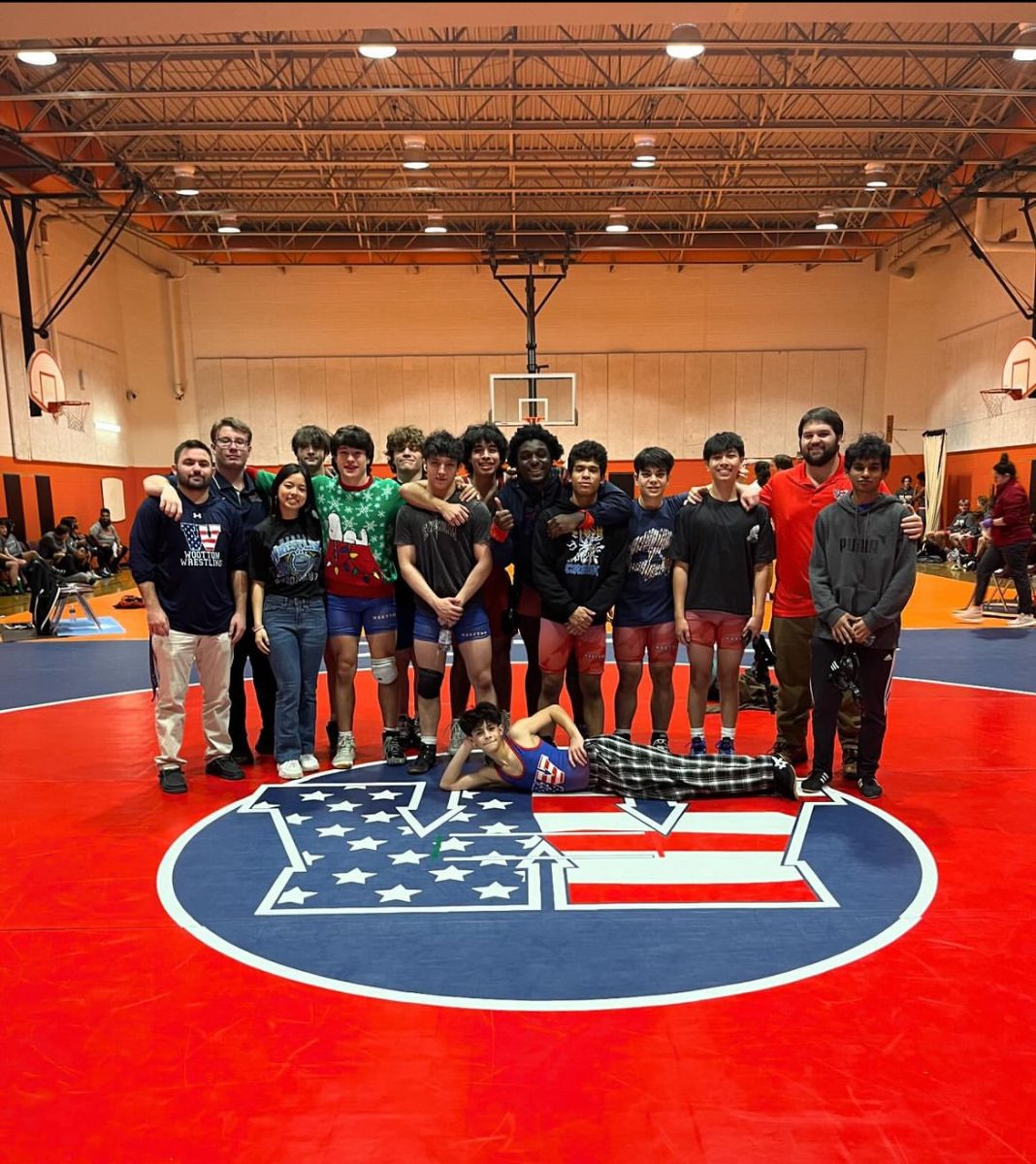 Wrestling+alumni+watch+the+current++team+at+the+Rockville+Tumble+tournament+on+Jan.+7.