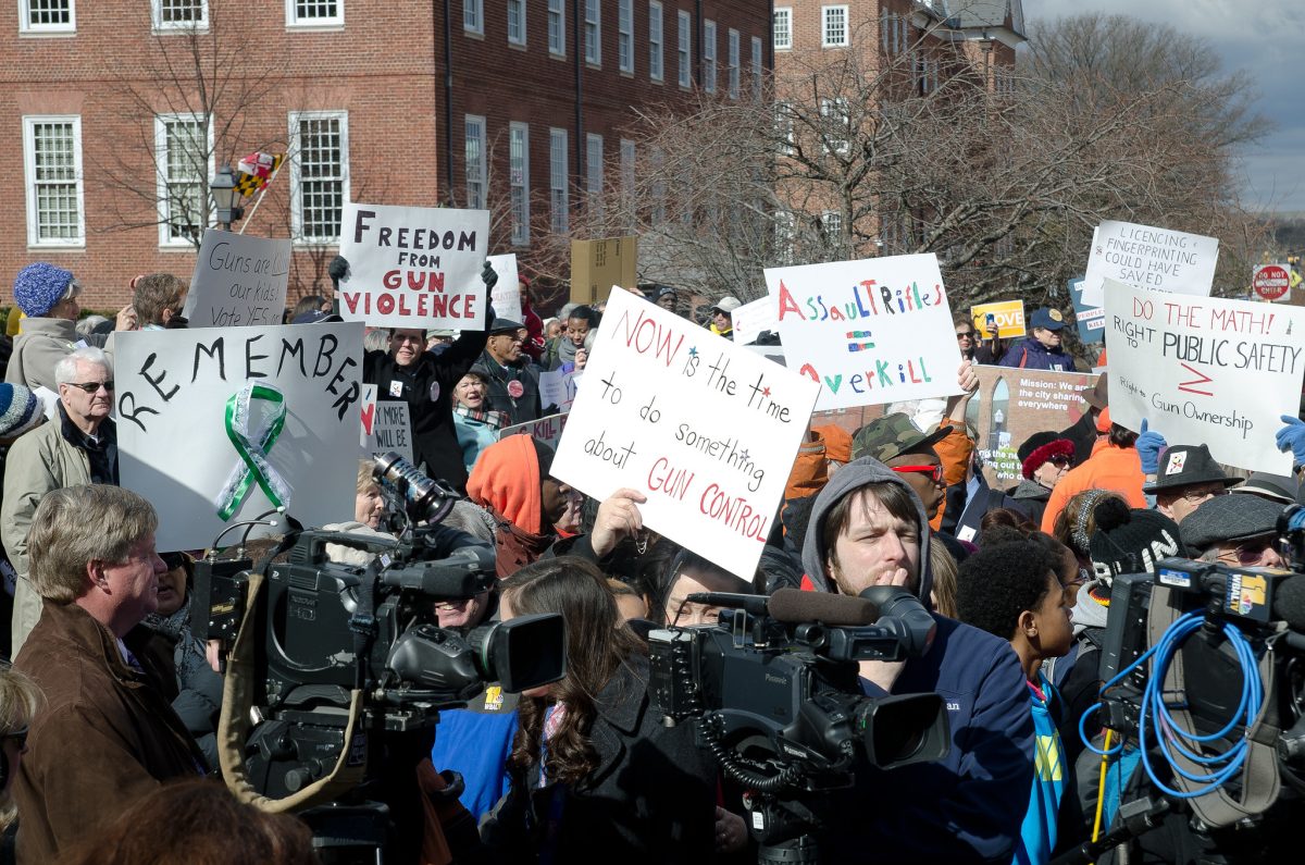 A group of protestors rally to prevent gun violence.