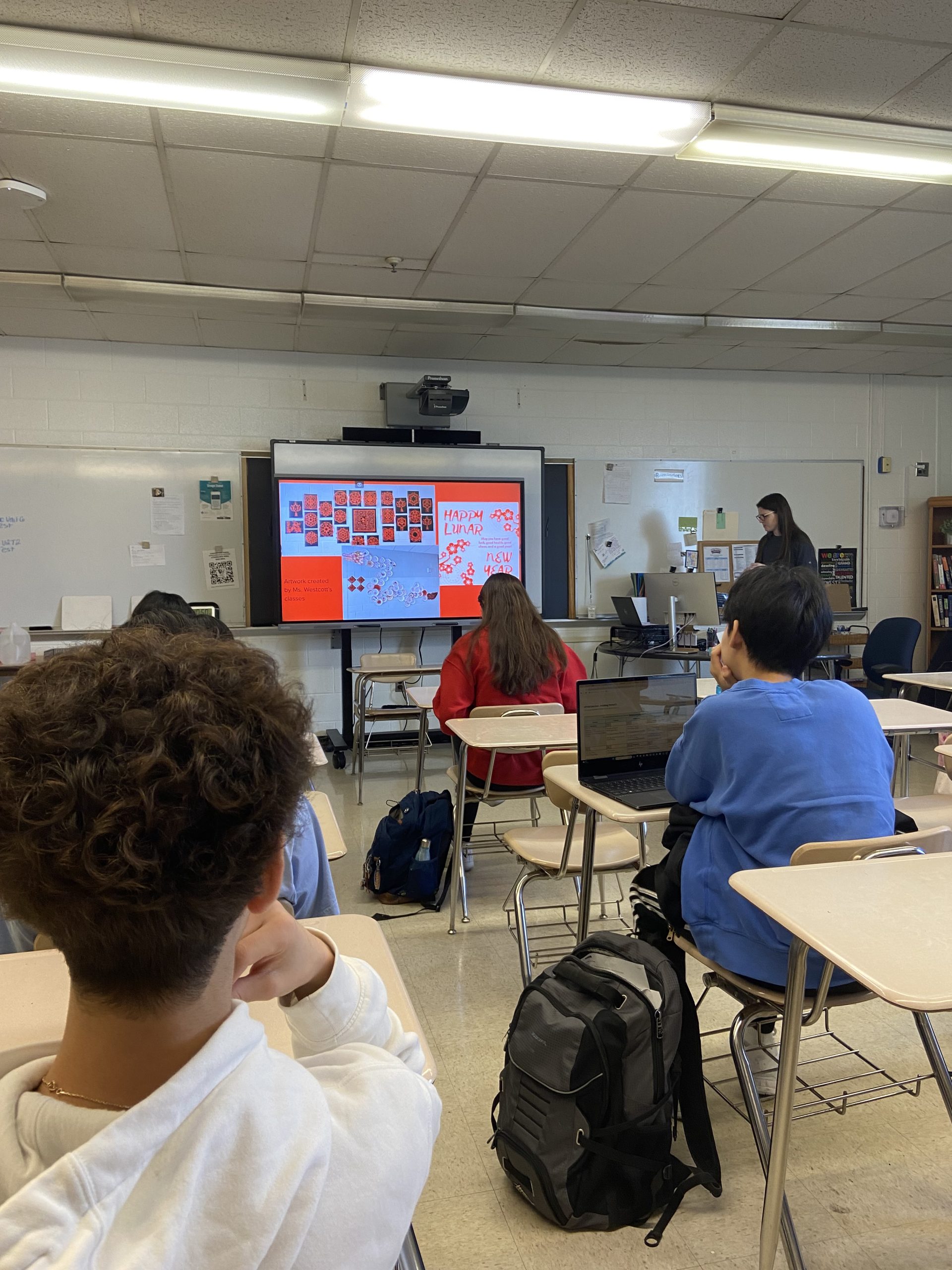 AP Calculus teacher Madison Swan teaches the Lunar New Year themed Wellness Wednesday to her extended fourth period on Feb. 14. This lesson was all about the Chinese Lunar New Year as well as school announcements.