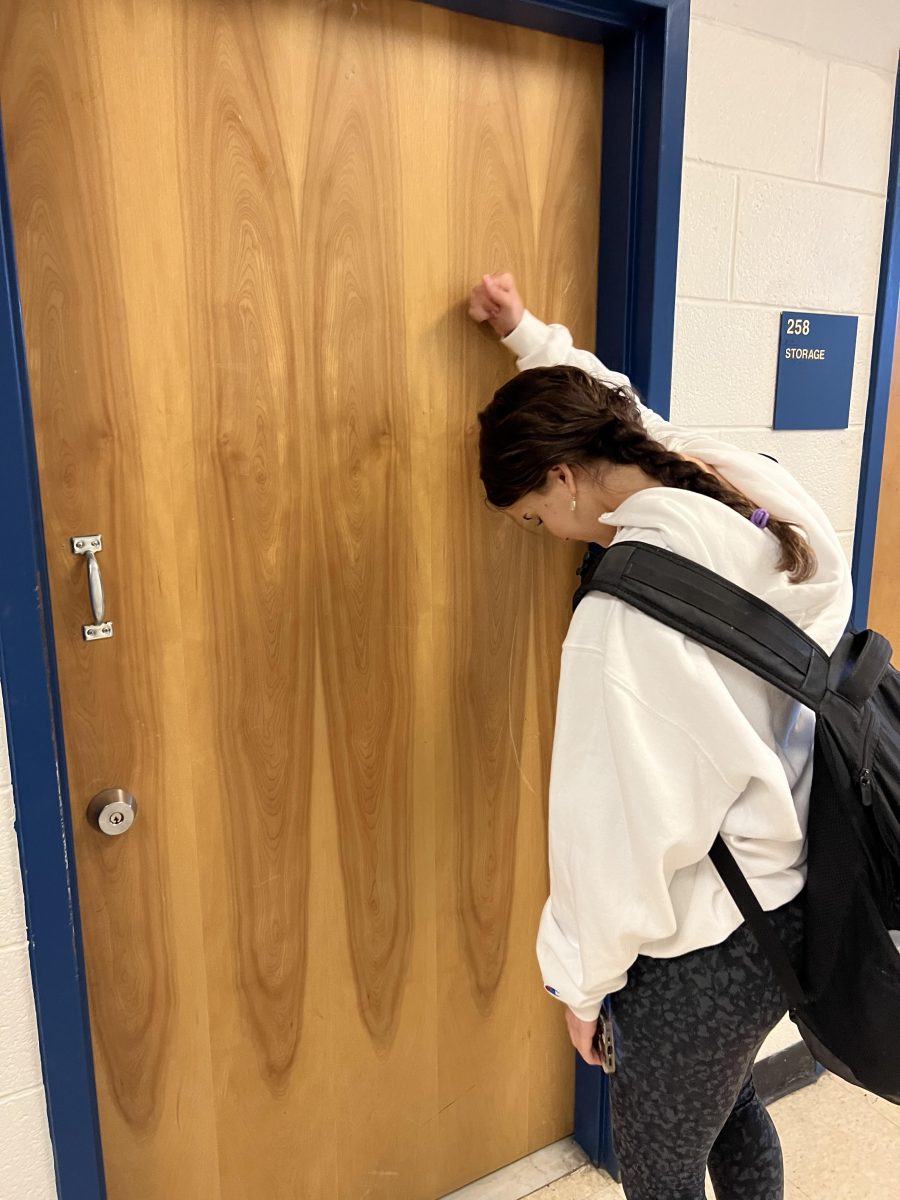 Senior Lizzie Misovec is devastated that she cannot enter the locked bathroom to meet with her friends as planned.