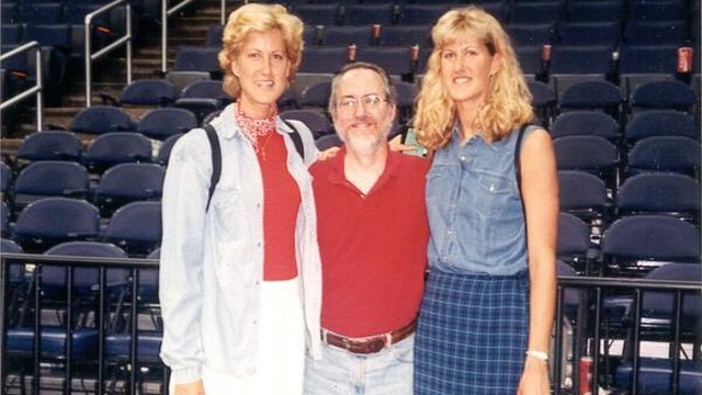 Heidi and Heather Burge pose with a fan at the Capital One Arena. The Burge twins are the center focus of the 2002 Disney Channel Original Movie, Double Teamed.