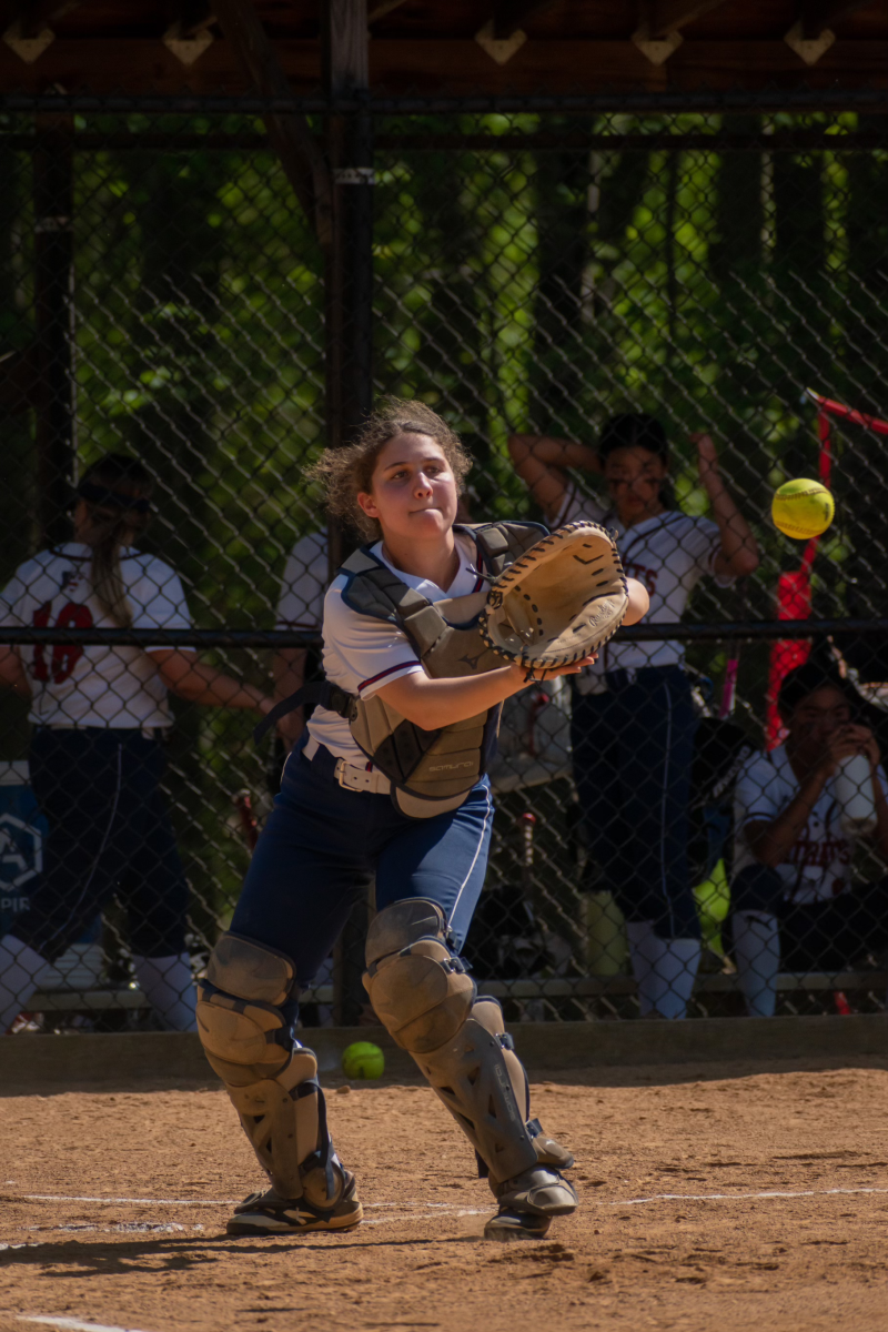 Senior+catcher+Malia+Schmelzer+catches+a+ball+during+warmups.+Schmelzer+has+enjoyed+playing+softball+for+the+last+three+years+and+looks+forward+to+a+successful+season+ahead.+This+season+should+be+a+lot+of+fun+and+I+encourage+people+to+come+watch%2C+Schmelzer+said.