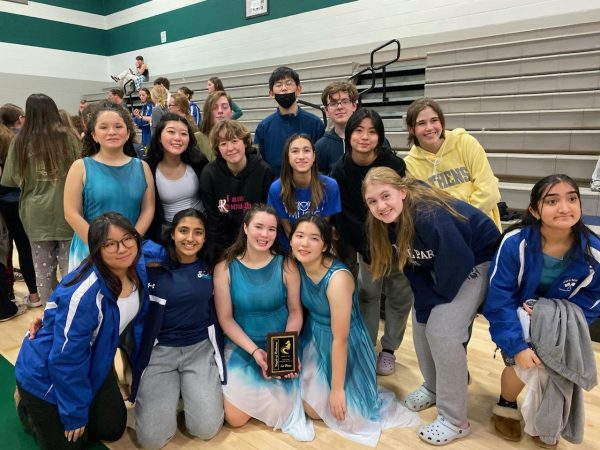The North Potomac Area Color Guard takes a group picture after winning first place in the Scholastic Regional AA division at their first competition of the winter season. Guard helped me create so many great memories with my teammates, sophomore Summer Yao said.