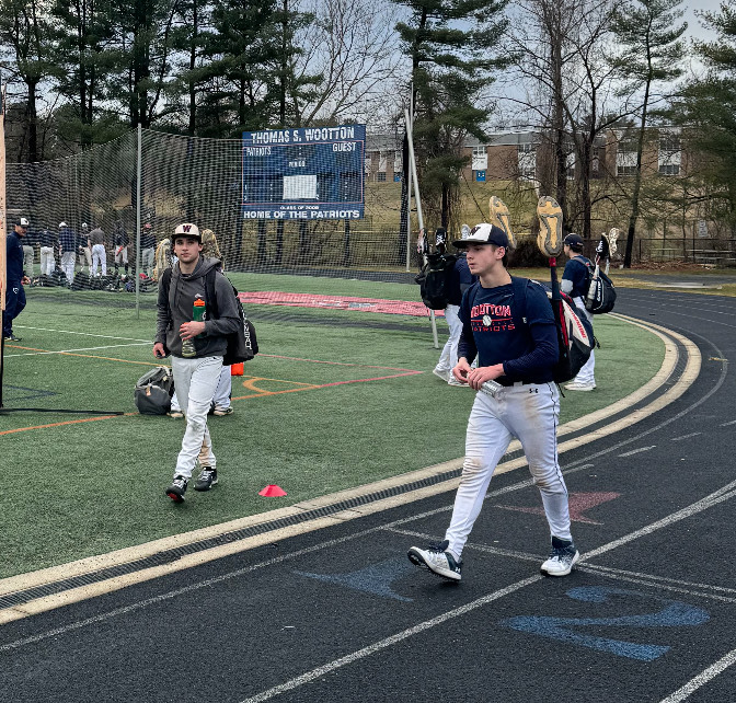 Sophomore Max Scherr and sophomore Blake Graham exit baseball tryouts on Saturday, Mar. 2.