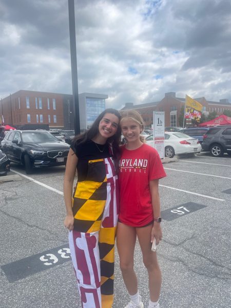 Alumna Jessica Winson and sophomore Emory Scofield stand outside the University of Maryland campus. I miss being able to see the same people every day, Winson said.