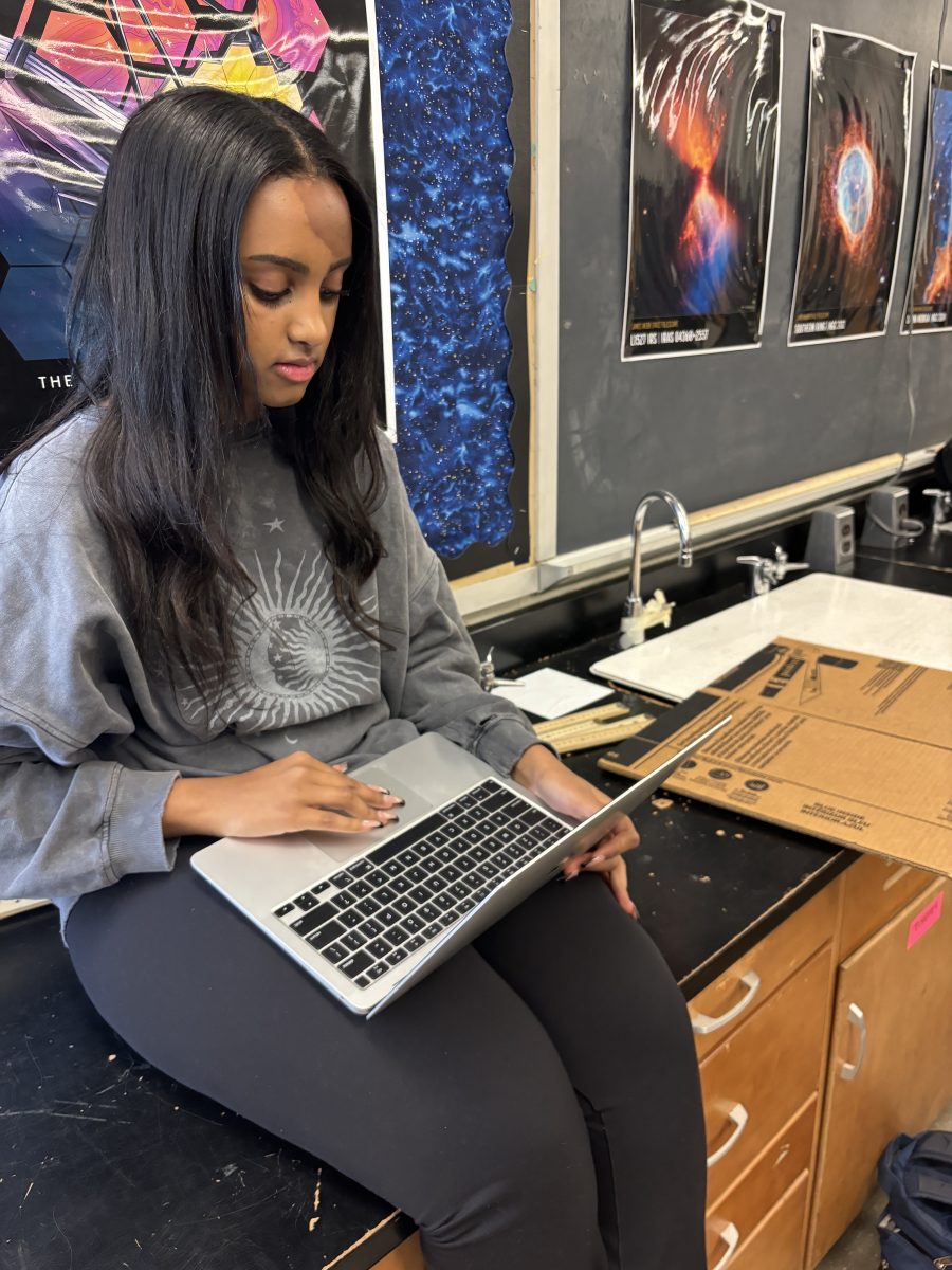 Junior Naomi Negussie studies for the May 4 SAT on Apr. 24 in room 213.