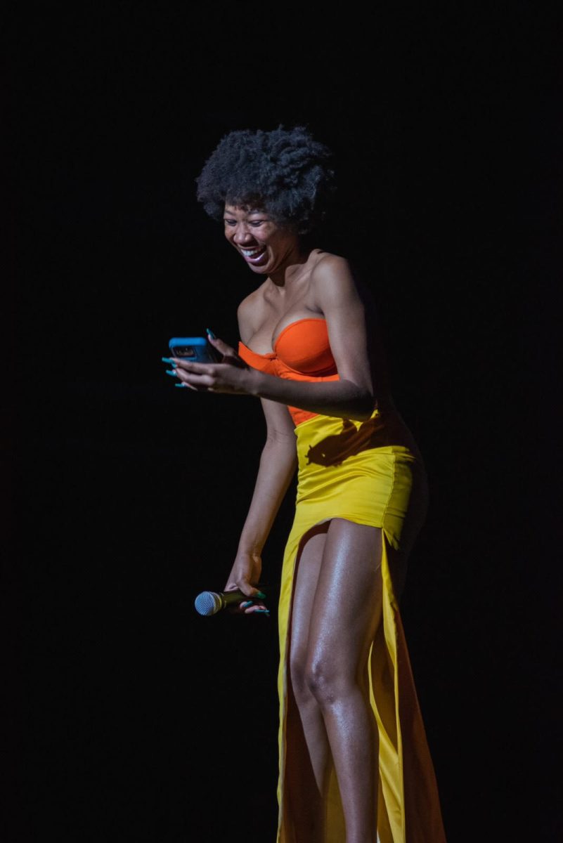 Sophomore Chloe Ayissi-Etoh presents during a fashion show in 2023. Ayissi-Etoh sews, models and markets for her company, Chlolaná. “I just never thought I was going to love something that much,” Ayissi-Etoh said.