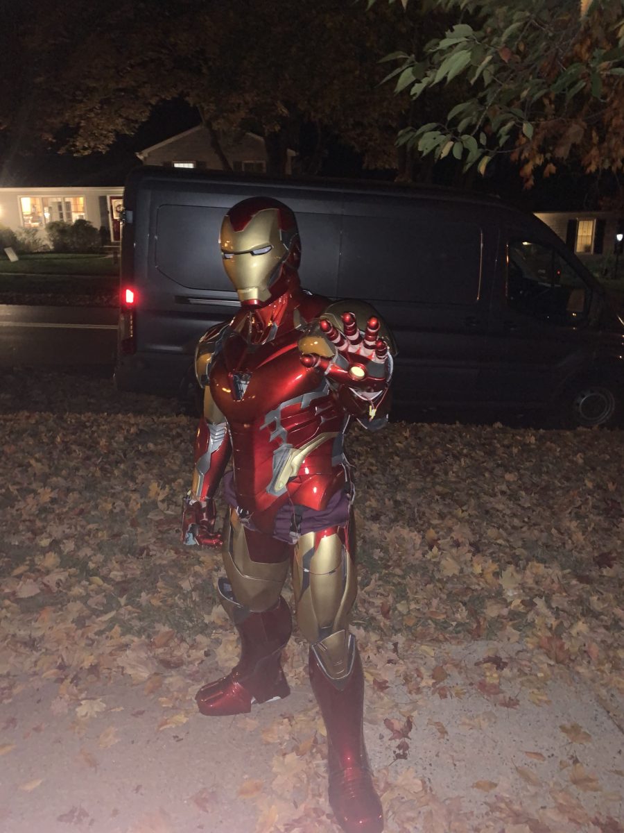 Junior Zachary Derman wears his 3D printed Iron Man suit on Halloween.