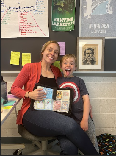 English teacher Melissa Kaplan brought her son Aleksander to Take Your Child to Work Day. He was proud to share his Pokemon collection.
