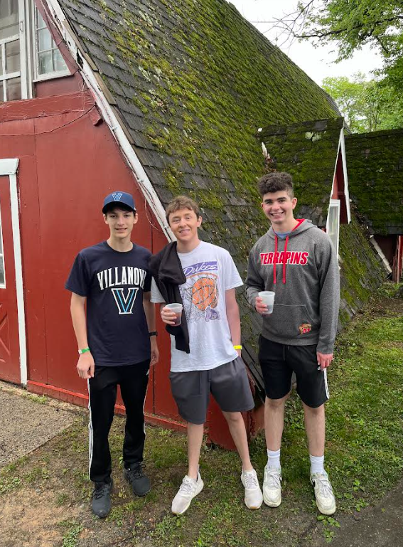 Seniors Darren Shapiro, Casey Bennett, and Evan Geisner enjoy the annual senior picnic on May 10 at Smokey Glen Farm.