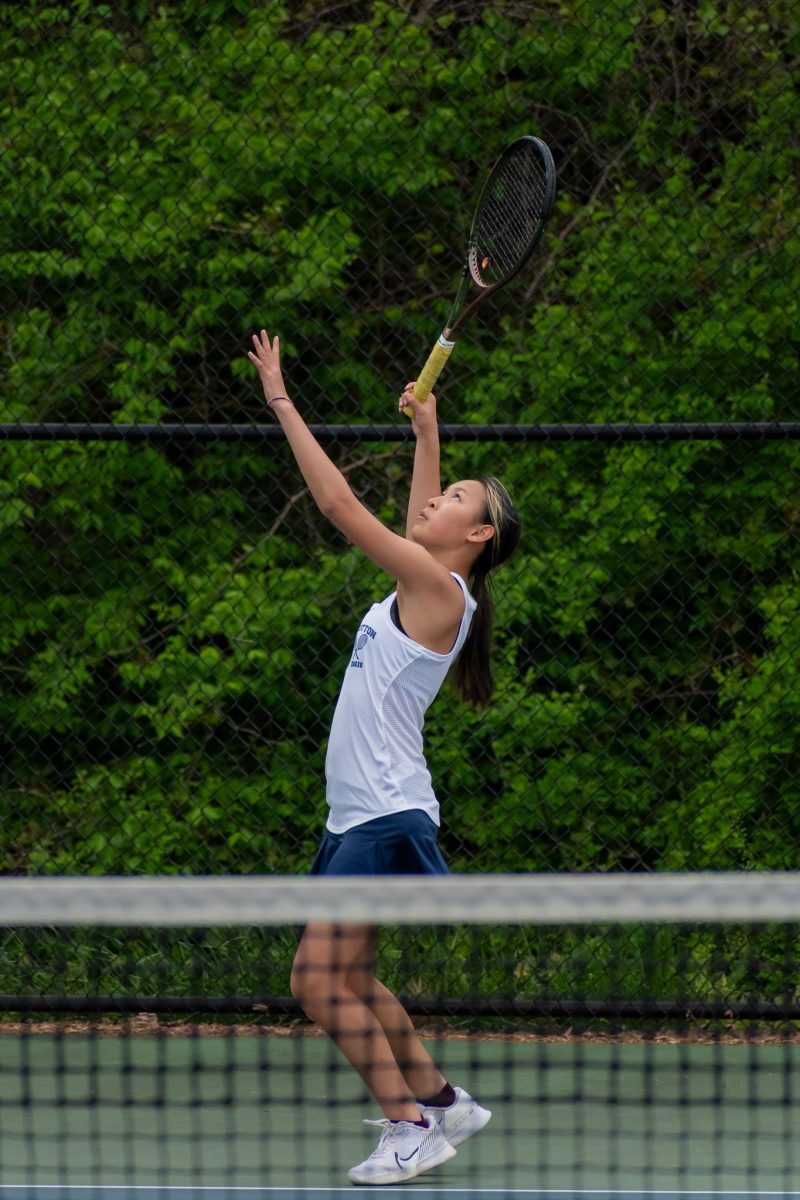 Sophomore Katherine Yao hits during a match against Richard Montgomery  on Apr. 17. Girls tennis won the match 5-2.