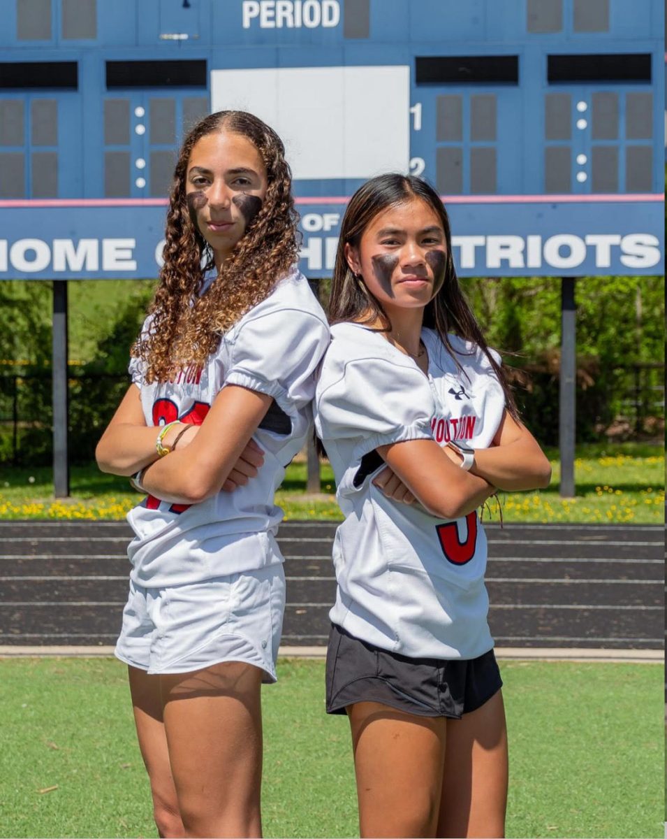 Sophomores Maya Bellamy and Megan Lomotan pilot the flag football program. Both students are excited for flag football to come to this school and cant wait to play it next fall.