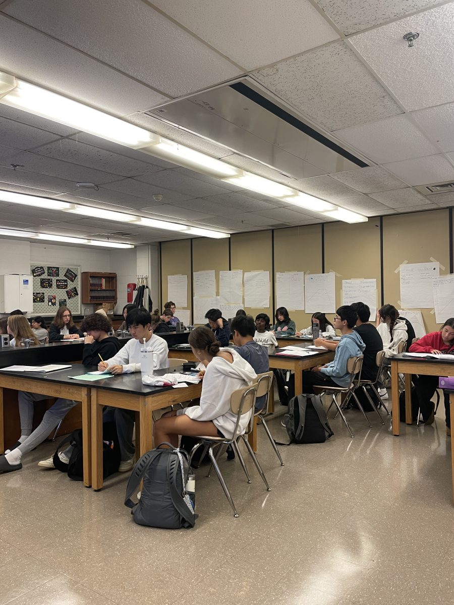 Chemistry teach Ellen Polster's class takes notes during a lecture about significant figures on Sept. 12. Chemistry is a key subject for the science section of the ACT.