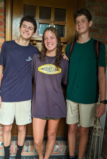 College freshman Sofia Gabrielle readies for the first day of school with her younger brothers, sophomore Luke Gabrielle (left) and freshman Tino Gabrielle (right). Sofia and Luke spent a year together at school last year. Luke will now have to adjust to life without his older sister in the building.