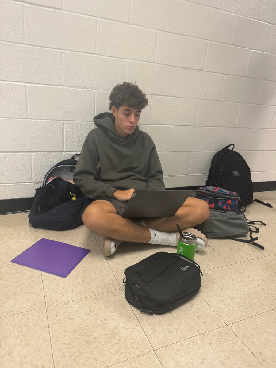 Senior Tobias Subiela works on his college applications during lunch. He said that any free time should be used to his benefit. “During advisories and lunches I take those times as opportunities to finish supplemental essays, " Subiela said.