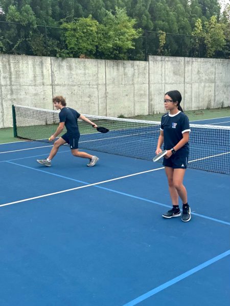 Senior Travis Skylar and freshman Mikayla Ko play doubles during an exhibition pickleball game against Gaithersburg.