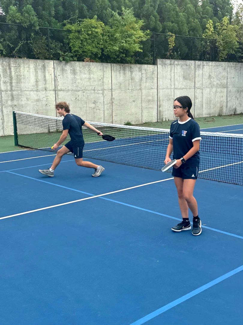 Senior Travis Skylar and freshman Mikayla Ko play doubles during an exhibition pickleball game against Gaithersburg.