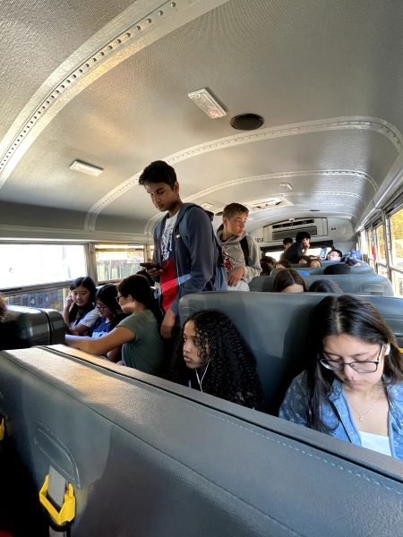 Bus 5311 fills with students every day after the school day ends. Due to the number of people on the bus, students are forced to stand or sit in the aisle if they are unable to squeeze into already occupied seats. “It’s especially annoying if I ever need to take home my instrument or an extra bag or literally anything that takes up extra space because of how squished together everyone is,” junior Mia Yang said.