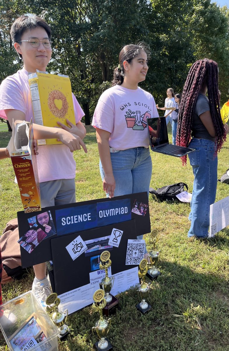 Seniors Justin Kim and Aarna Rastogi promote Science Olympiad at the Club Expo on Sept. 20 during lunch. Kim and Rastogi are both co-captains for the club this year. "[The Club Expo] gives everyone a chance to explore the new clubs that pop up every year and join old ones," Rastogi said.