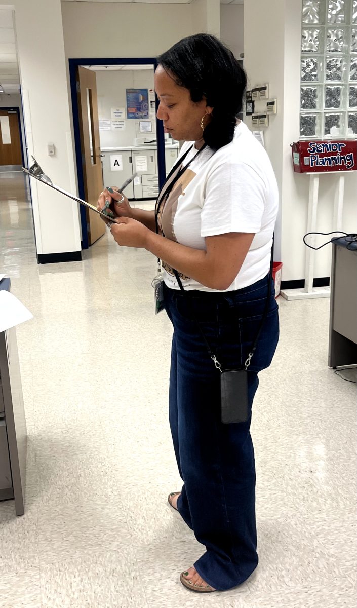 Assistant Principal Stephanie Labbe reviews notes from a classroom observation. These observations are key for teachers' development.