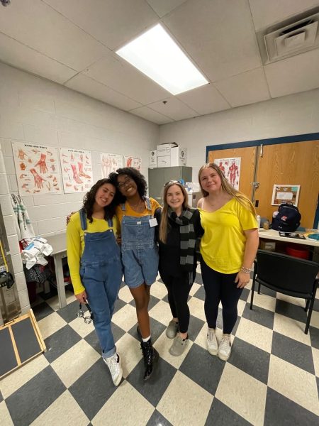 Athletic trainers Sara Pinzon, Leanne Brown, Brenna Alle, and Rebecca Ogorodnikov dress up as characters from "Despicable Me." "It was a last minute idea that we had but it ended up being fun and I'm really glad we did it," Brown said.