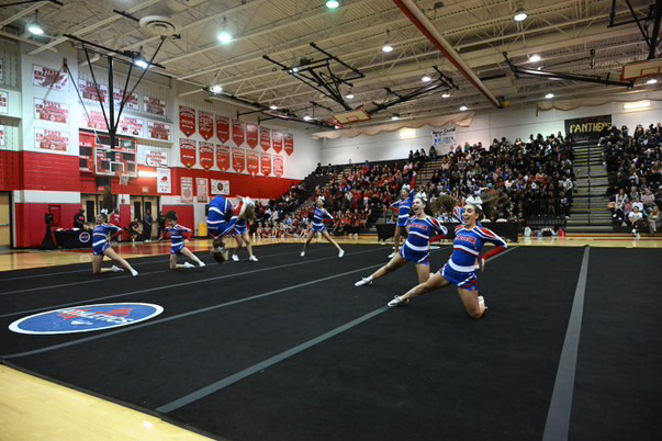 Varsity cheer performs at the county competition at Blair on Oct. 26, where they placed fourth.