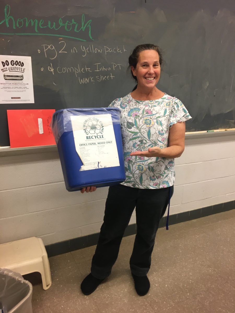 Honors Chemistry teacher Aileen Ruderman displays her recycling bin, positioned in front of the doorway to motivate students to recycle.