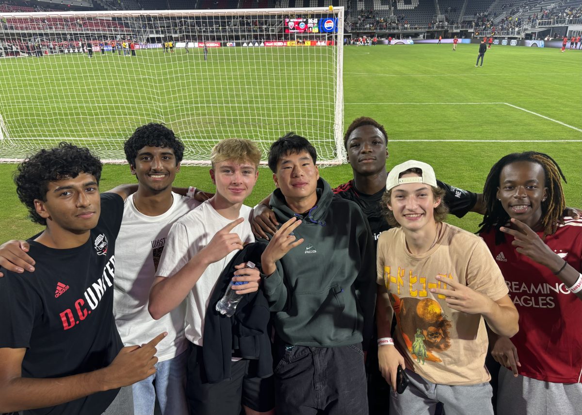 Juniors Shreyas Ganeshan, Varun Rajesh, Cameron Cowen, Kevin Sun, Langston Fabiyi, Alex Grainger and Kioko Kibua celebrate following Fabiyi's first-team debut for D.C. United. Fabiyi joined the academy two years ago and hopes to secure his role in the first team soon.