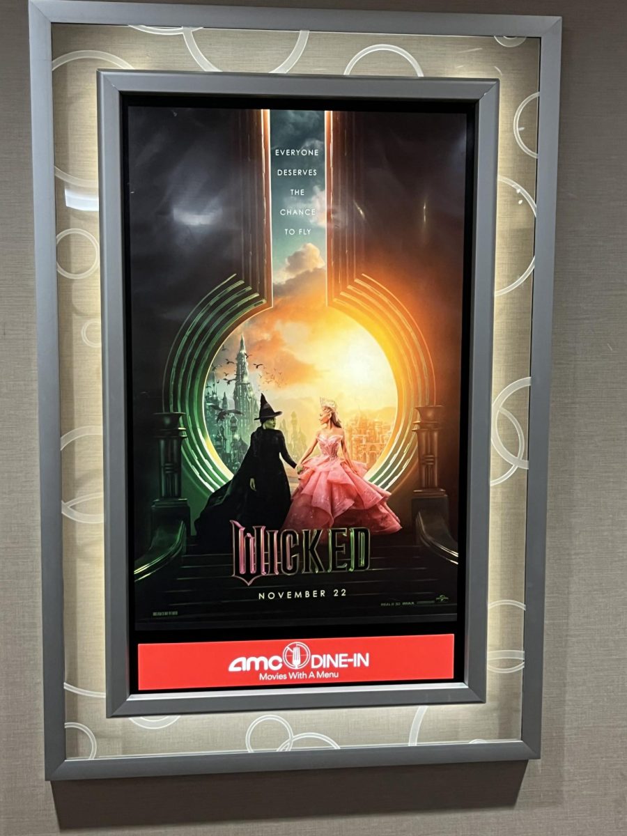 The poster for Univeral Pictures' "Wicked" in the Rio AMC theater shows Elphaba (Cynthia Erivo) and Glinda (Ariana Grande). "We really took care of what had come before, we trust in it. The music is really beautiful," Erivo said to People magazine.