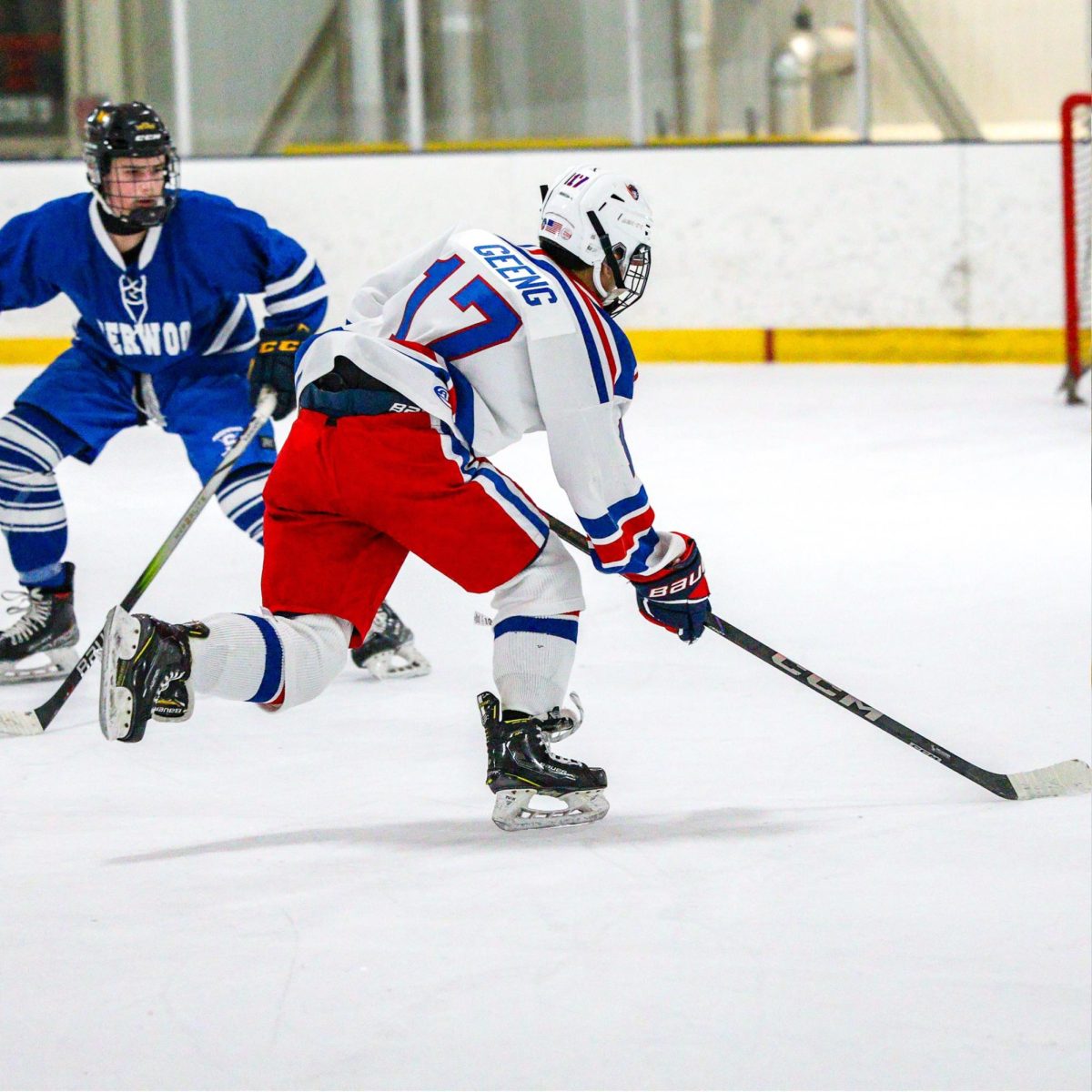 Sophomore Nathan Geeng skates against Sherwood on Dec. 6. The game ended 6-5 for their first loss of the year but the team is looking to bounce back against Churchill on Jan. 2. "I feel confident that we can make a run for states this year as our team is really strong at every position," senior Sam Hosier said