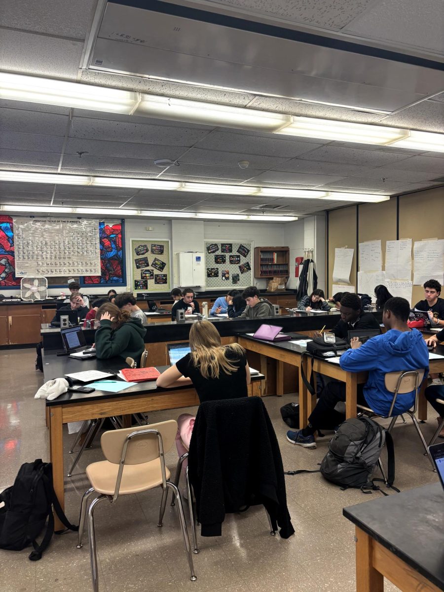 Students review for a physics unit test during eighth period class on Dec. 11.